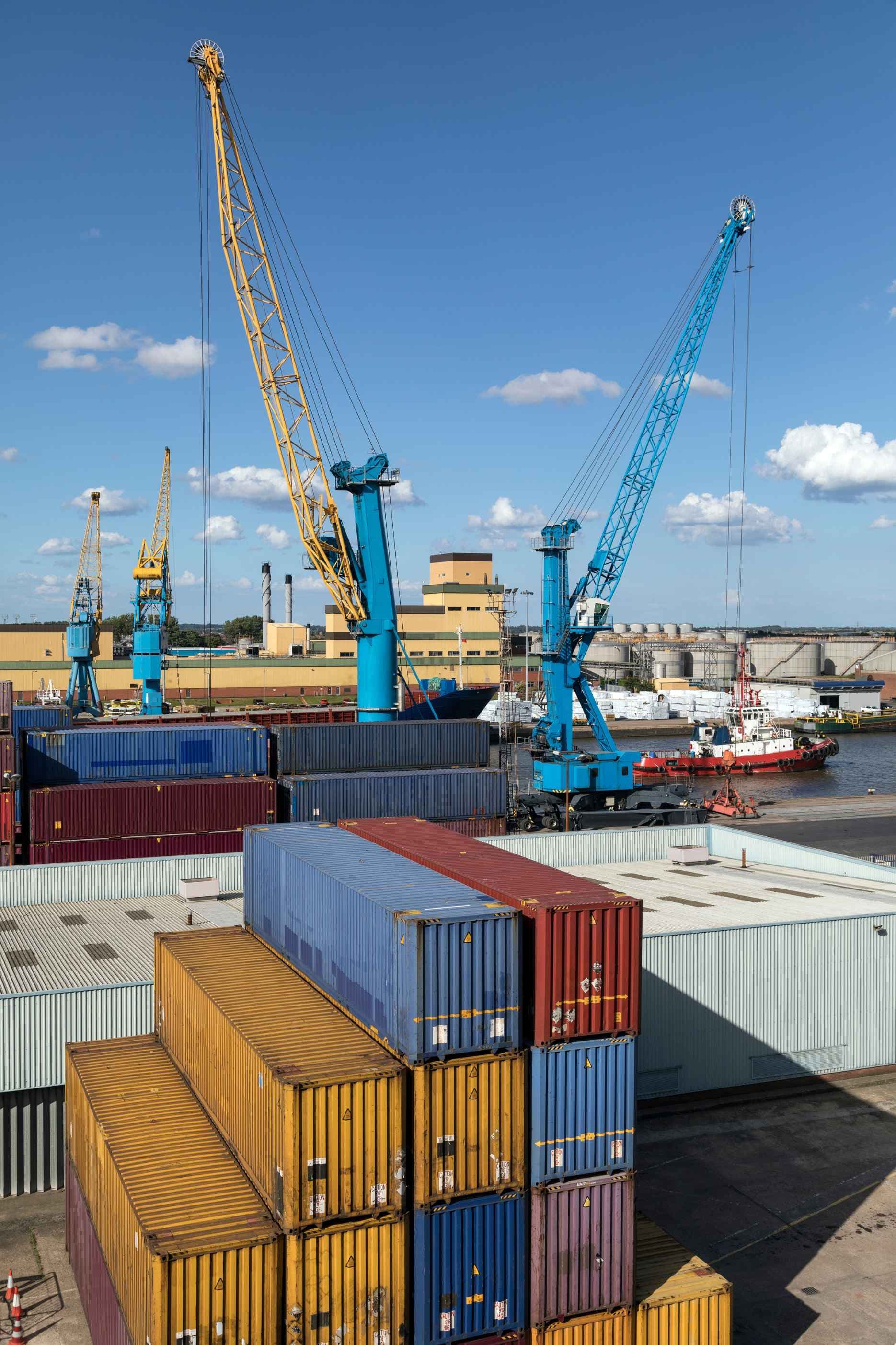 Containers and cranes at an industrial port